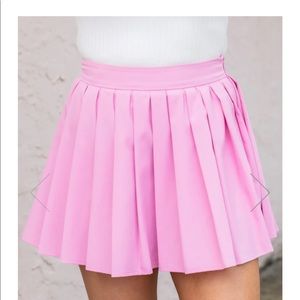 Pink lily pleated pink tennis skirt